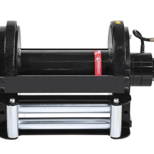 PIERCE 30,000 lb hydraulic recovery winch with long drum and air clutch, mounted on a metal base with rollers and control box.