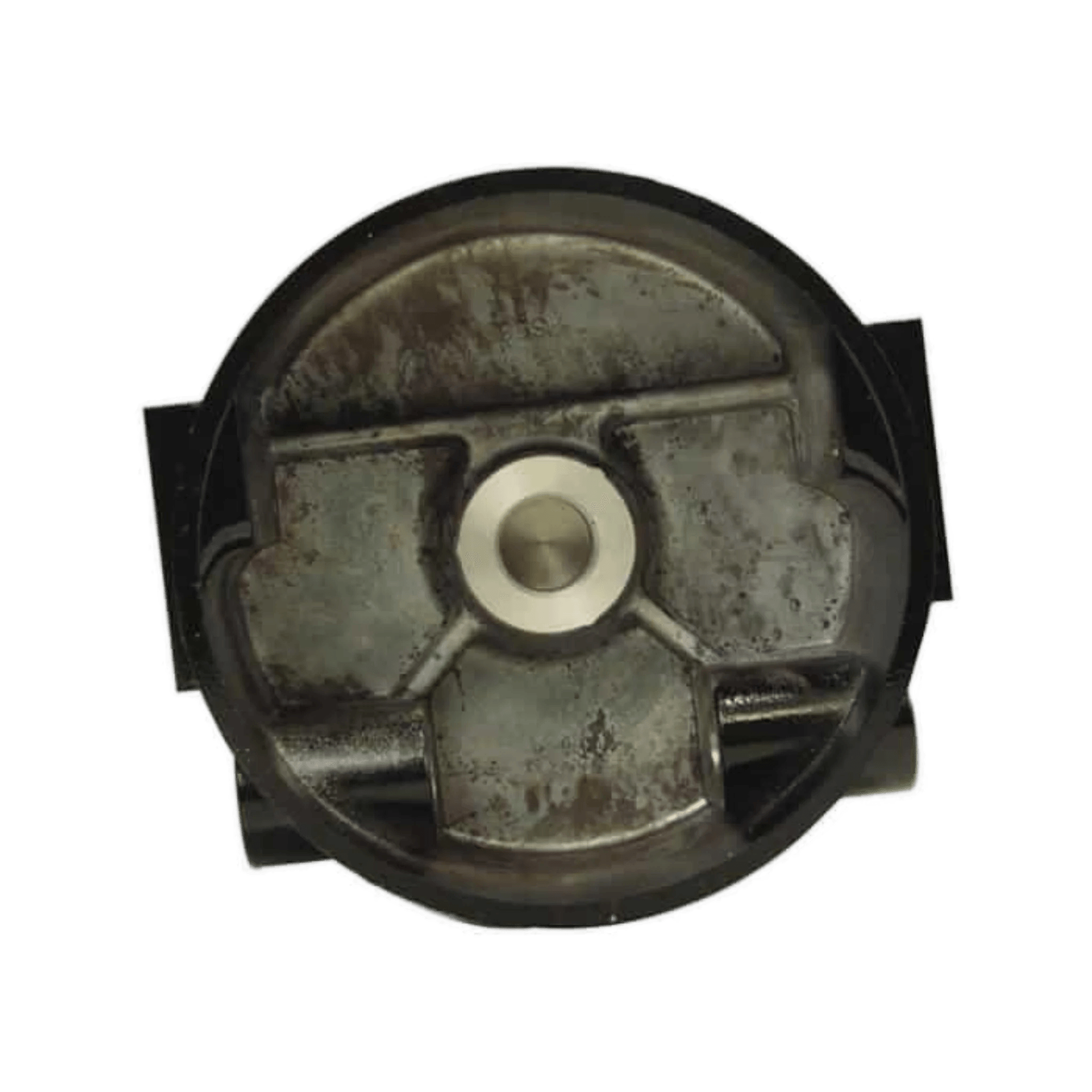 Top view of a round metallic clutch housing with central protrusion from PIERCEs winch series, showcasing its rugged, worn surface. Ideal for those considering replacing housing for enhanced performance.