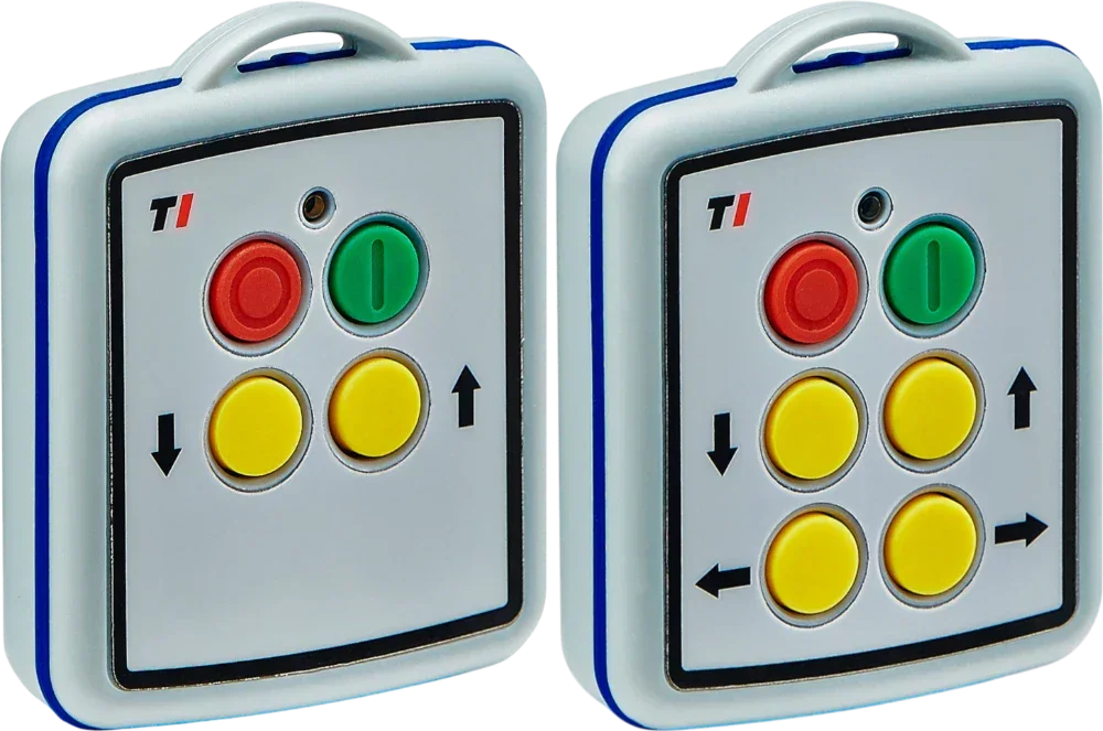 Two identical control keypads with colored buttons: red, green, and four yellow buttons with arrows.