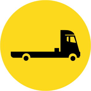 Black silhouette of a flatbed truck on a yellow circular background.