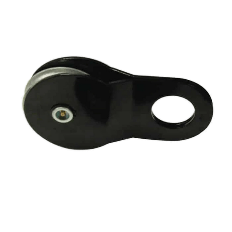 The Internal - Pierce Assembly Team 12,000 lb Recovery Winch features a black metal snatch block with a pulley and circular hole, perfect for handling ropes or cables during towing or recovery operations.