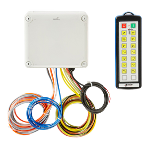 A 14 Function IP Wireless Actuator Control System from Lodar LTD, complete with multicolored cables, is positioned next to a remote control, seamlessly integrating into the industrial transmitter setup.
