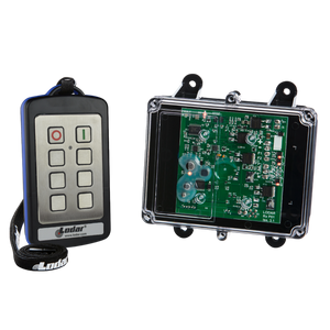 The 2 Function Stainless Steel IP Wireless Control System from Lodar LTD's 92 Series, featuring a FET Receiver, includes buttons placed alongside a clear-cased electronic circuit board, making it perfect for industrial environments.