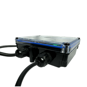 The 2 Function Wireless Control System for Dump Trailer by PIERCE is an elegant black, rectangular electronic device with cables, boasting a clear top with blue edges and effortlessly integrating with wireless systems.