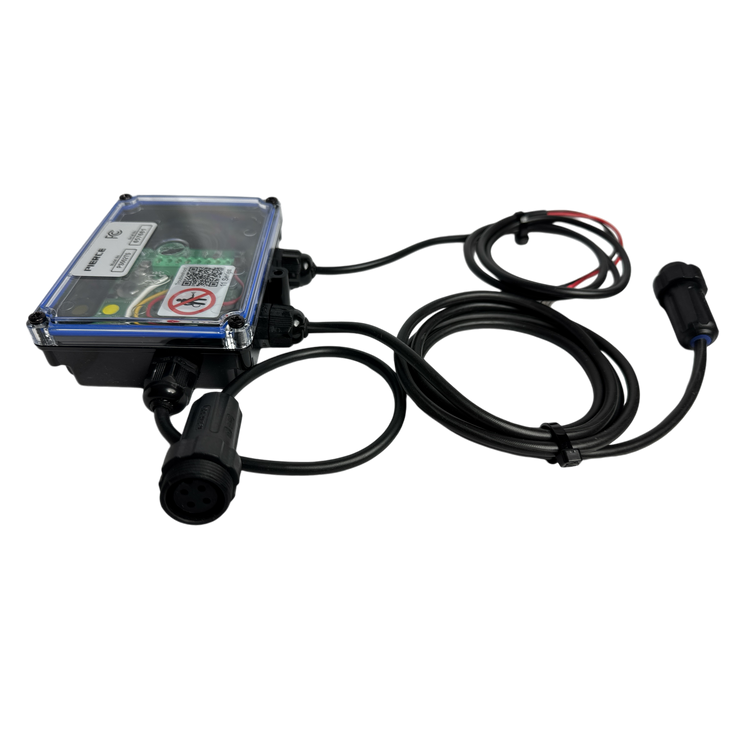 A PIERCE 2 Function Wireless Control System for Dump Trailer, featuring multiple connectors and wires, sits against a black background, seamlessly integrating into a wireless system.