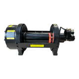 The PIERCE 30,000 lb Hydraulic Recovery Winch with long drum and manual clutch is shown mounted on a stand with warning labels, isolated on a white background.