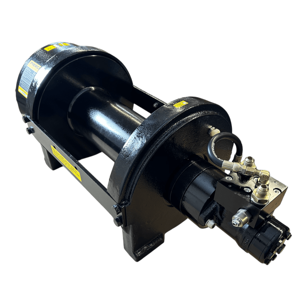 PIERCE 30,000 lb Hydraulic Recovery Winch with long drum and manual clutch, featuring hydraulic components and yellow safety labels, designed for heavy recovery tasks, shown on a white background.