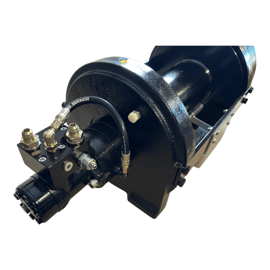 The PIERCE 30,000 lb Hydraulic Recovery Winch with long drum and manual clutch is shown angled on a white background, featuring hoses and metal fittings, and engineered for heavy-duty recovery operations.