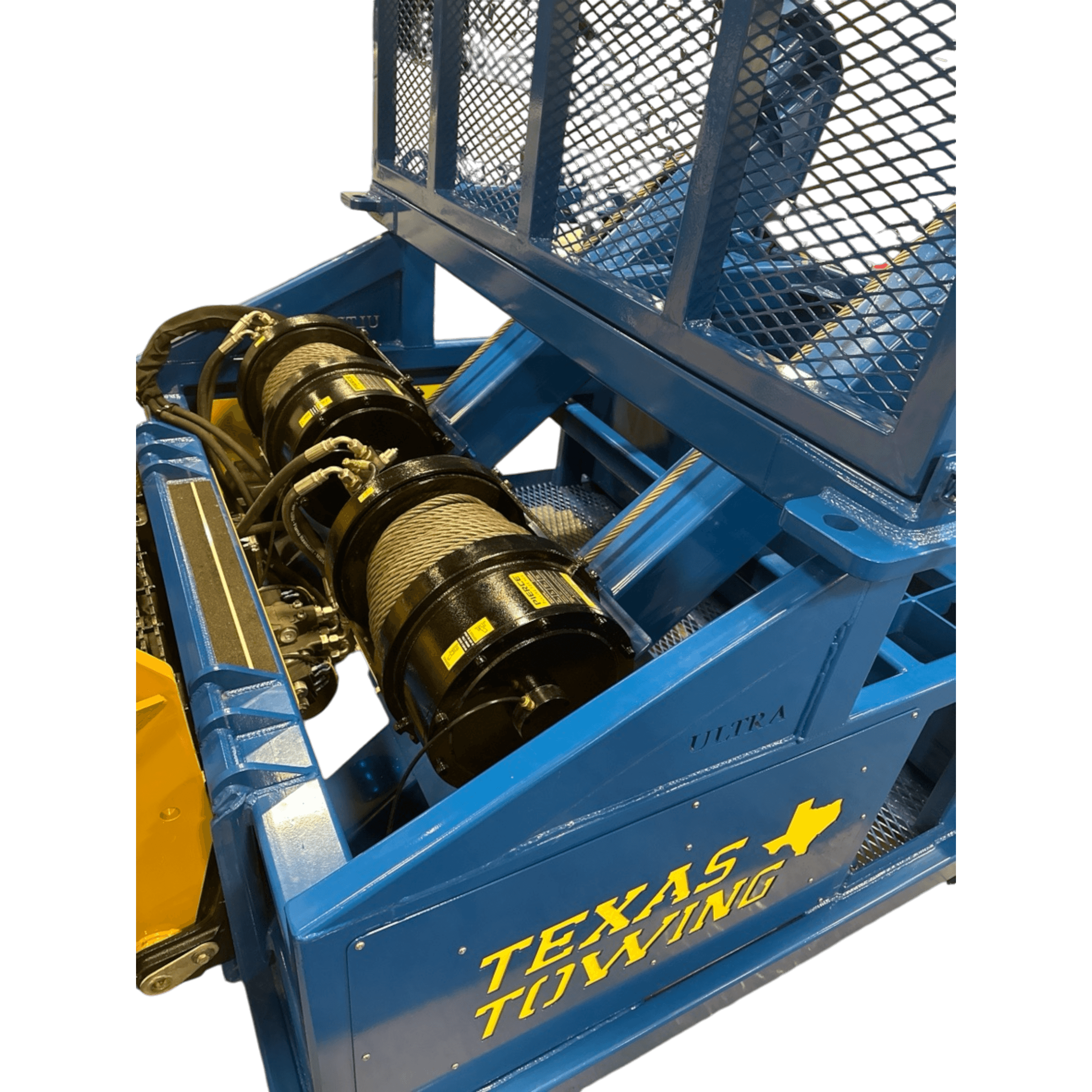 PIERCE 30,000 lb Hydraulic Recovery Winch with narrow drum and air clutch is mounted on a blue tow truck with TEXAS TOWING text and yellow state outline; metal mesh above ensures reliable, heavy-duty towing performance.