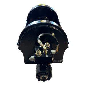 A PIERCE 30,000 lb hydraulic recovery winch with a narrow drum, robust manual clutch, and advanced planetary gear system rests elegantly against a dark backdrop.
