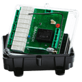 The Lodar LTD 4 Function 110V Replacement Relay Receiver, part of the 96 Series, features a transparent enclosure that encases a green circuit board with various components, all securely mounted within a black base. It is ideal for integration into 96 Series Systems as a replacement receiver for setups operating at 110V.
