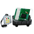 Beside a partially open electronic circuit box sits the Lodar LTD 4 Function Mini 110V Wireless Control System with an IP67-rated transmitter, complete with buttons and a wrist strap, showcasing its efficiency in wireless control.