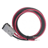 The Internal - Pierce Assembly Team 4 Gauge Wiring Harness features red and black heavy-duty cables with a gray quick disconnect and exposed wire ends, coiled neatly for convenience.
