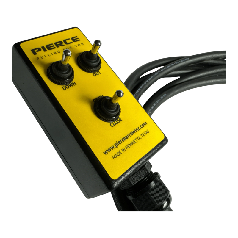 Close-up of a yellow and black PIERCE 6 Function Wrecker Remote with three switches labeled Down, Out, and Close—perfect for controlling hydraulic power units.