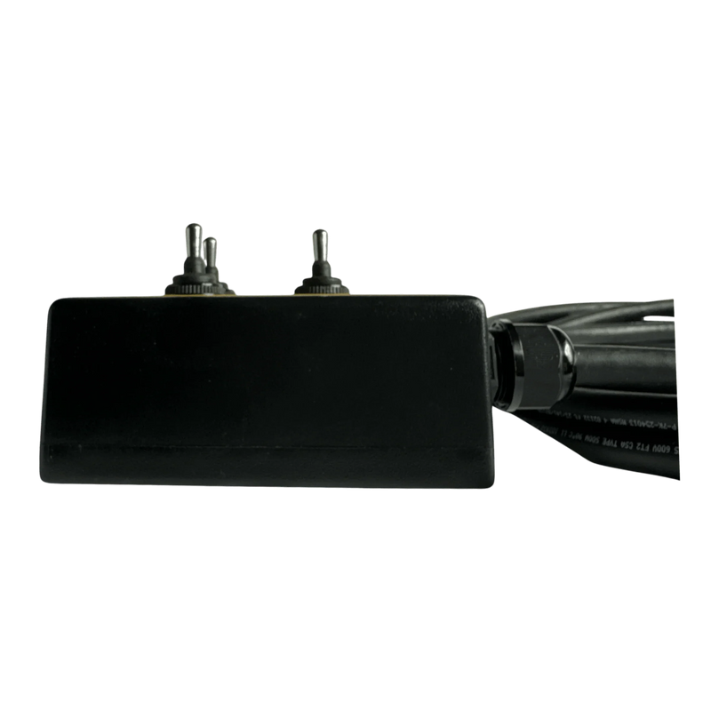 The PIERCE 6 Function Wrecker Remote is a black rectangular switch box with two toggle switches and cables, ideal for controlling solenoid systems.