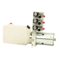 The Bucher Hydraulics Bucher 6 Way Valve Pump features a white fluid reservoir and metal valves, designed for wrecker use and compatible with Magnum III retractable wheel lift systems.