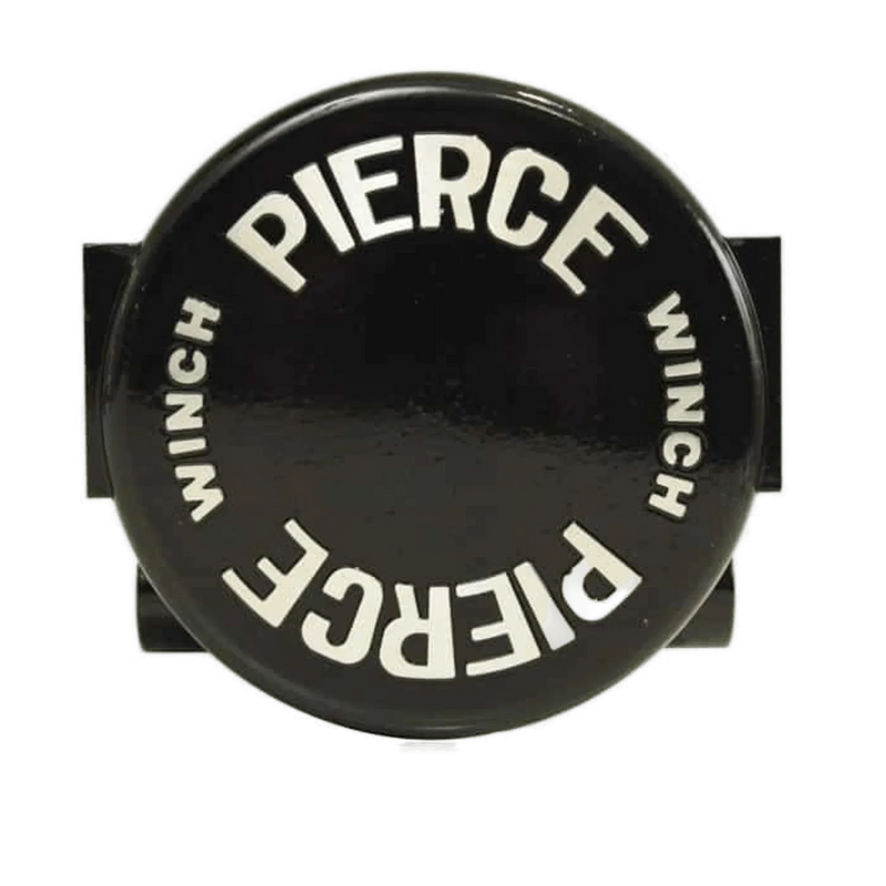 Black circular Clutch Housing w/ Bushing by PIERCE, featuring "PIERCE WINCH" in white (one upside down). Ideal as a replacement housing for your PS654 series Worm Gear Winch or when servicing the free spool function.