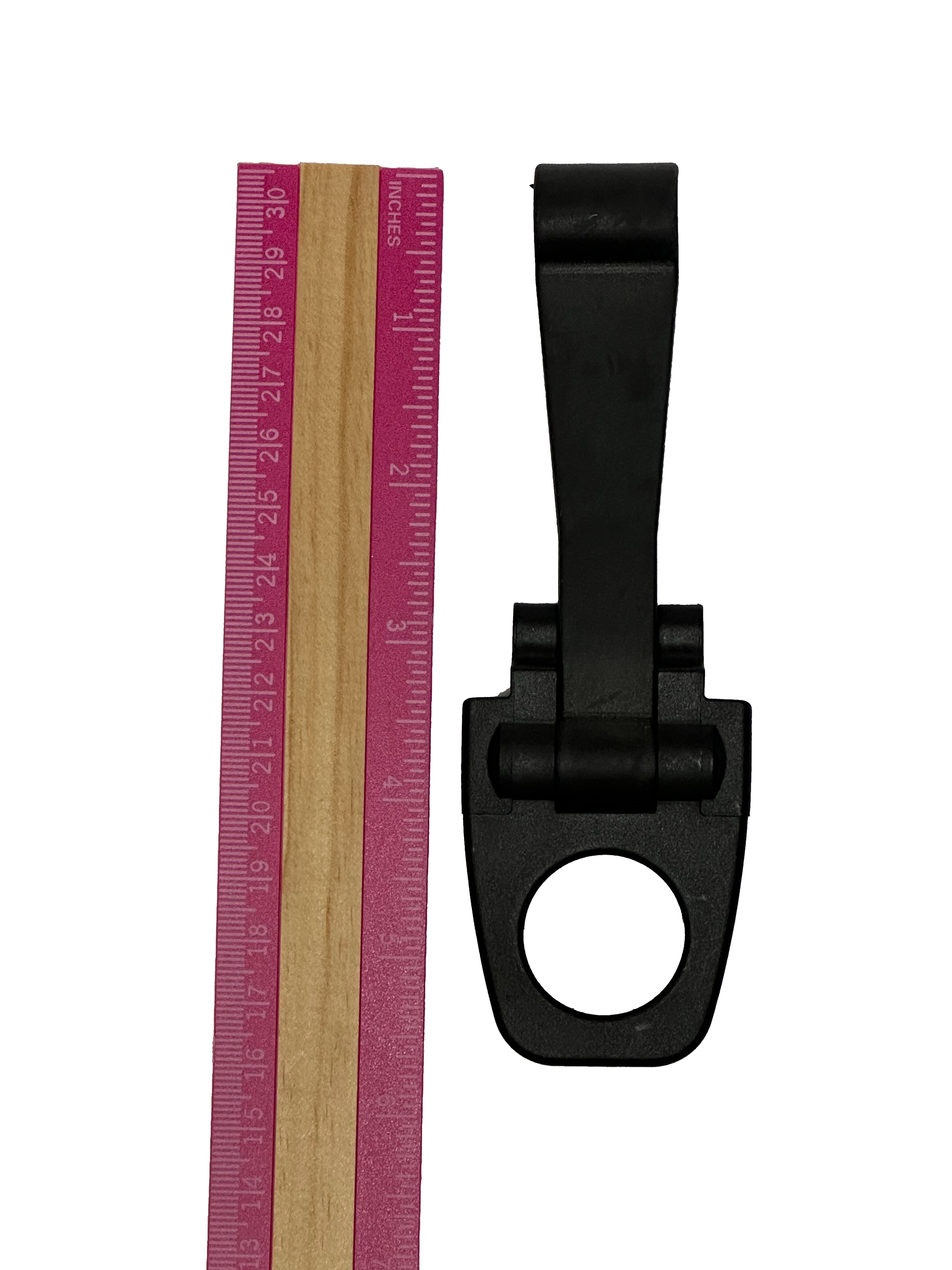 A PIERCE Coolers Latch Long Version 2 next to a pink measuring ruler against a white background.