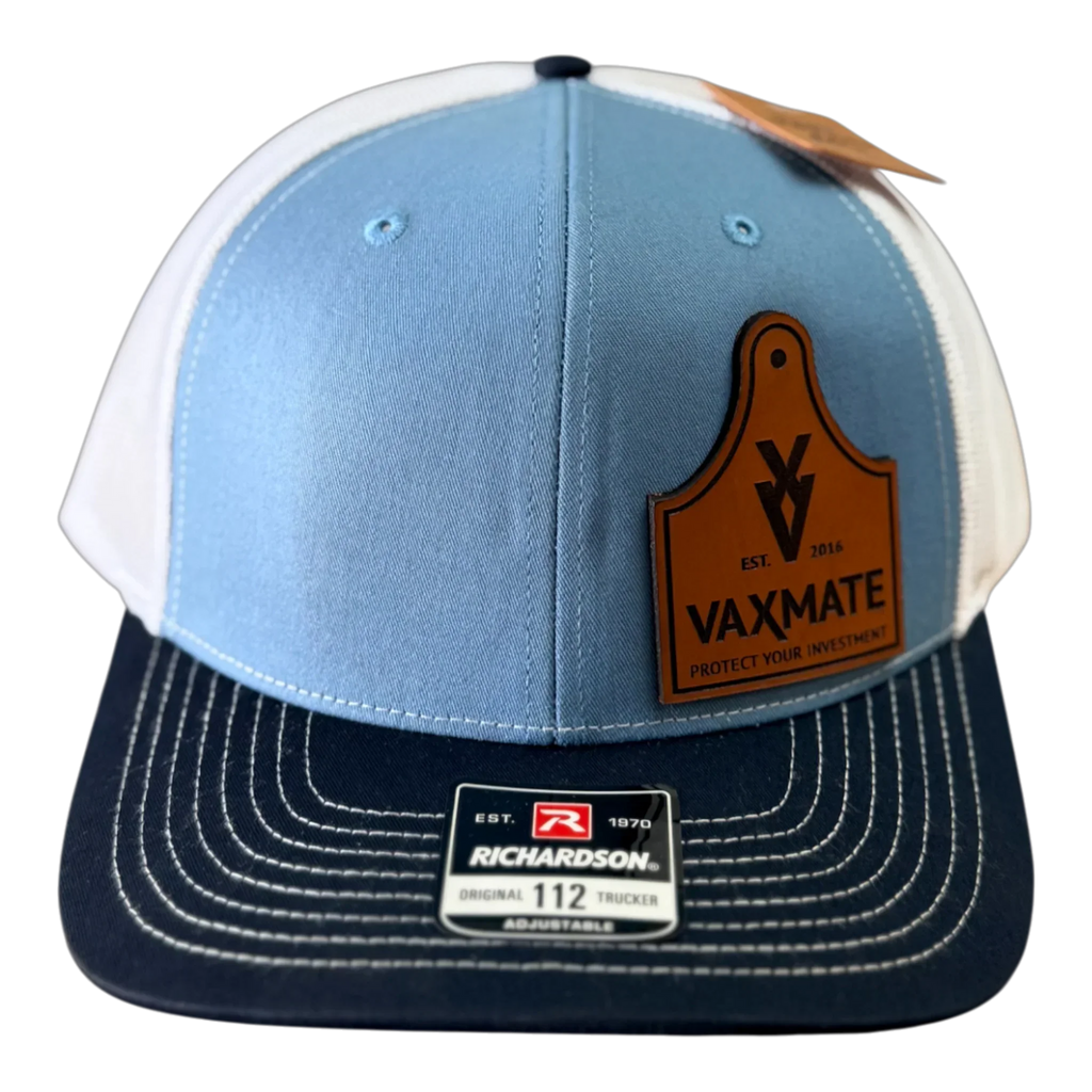 The PIERCE VAXMATE Trucker Hat with Leather Patch features light blue, white, and navy colors, plus a classic label on the brim.