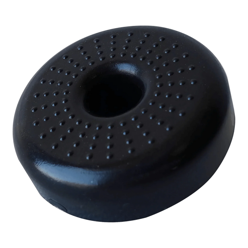 The PIERCE Coolers | Foot is a black, round, donut-shaped item featuring small raised bumps on its top surface.