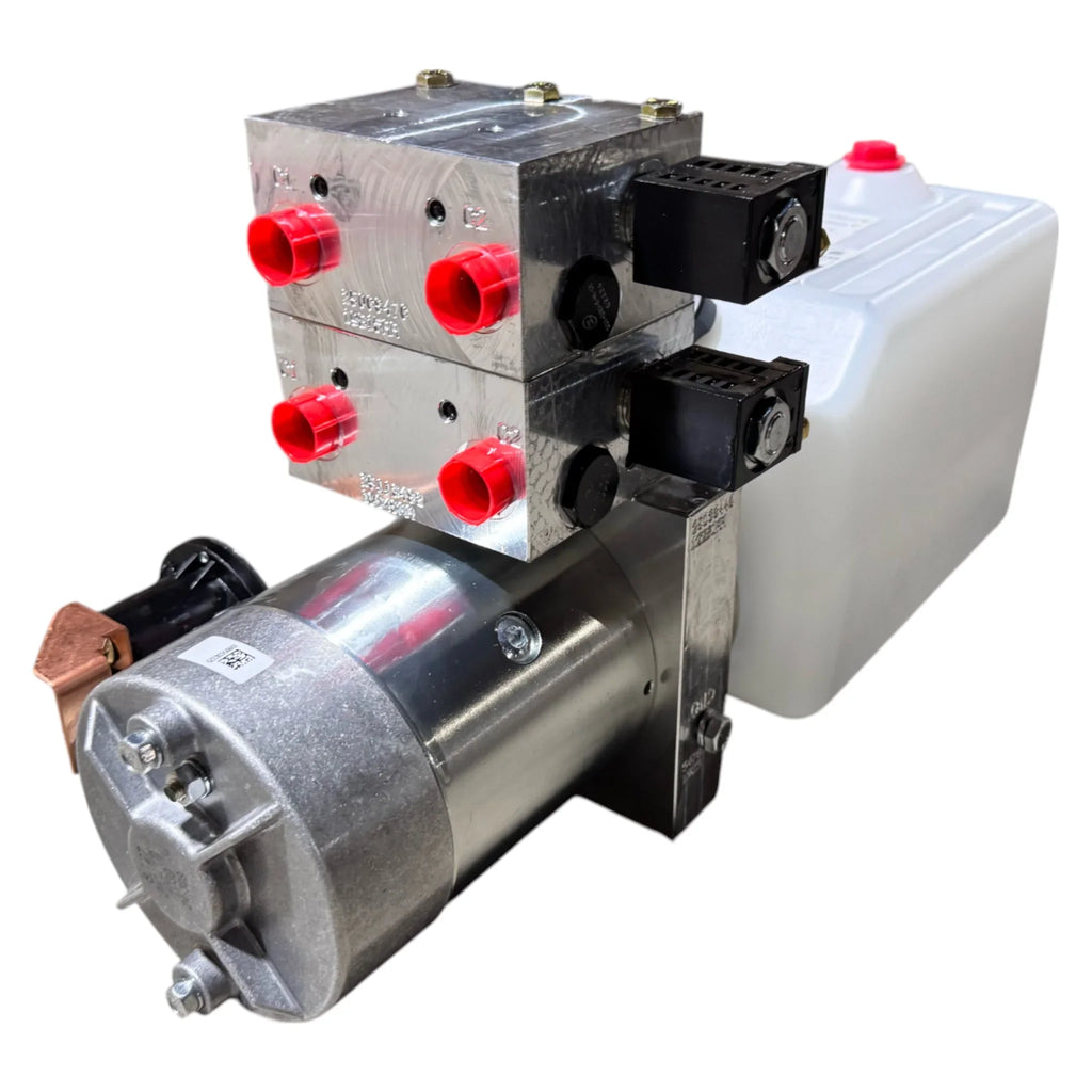 Hydraulic power unit featuring a Bucher Hydraulics, Inc. 4 Way Pump, reservoir, pump, motor, mounted valve block with red port covers, and an adjustable relief valve for optimal performance.