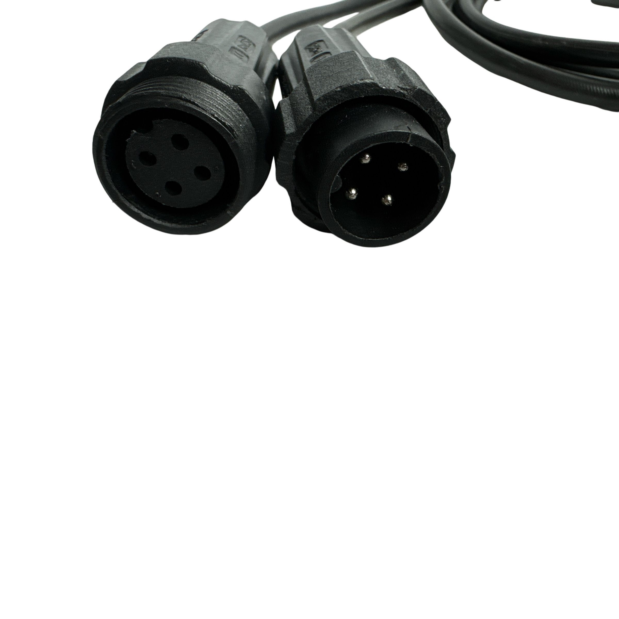 Close-up of two black circular audio connectors with multiple pins, resembling the complex components found in the PIERCE 2 Function Wireless Control System for Dump Trailer, set against a dark background.