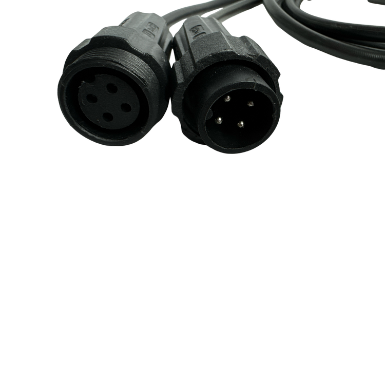 Close-up of two black circular audio connectors with multiple pins, resembling the complex components found in the PIERCE 2 Function Wireless Control System for Dump Trailer, set against a dark background.