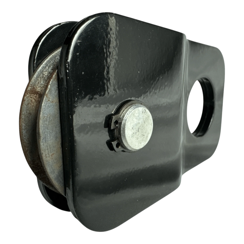 The PIERCE Snatch Block WLL 6,000 lbs. is a black metal pulley with a circular hole and visible rust on the wheel, designed for winch pulling up to 6,000 lbs.