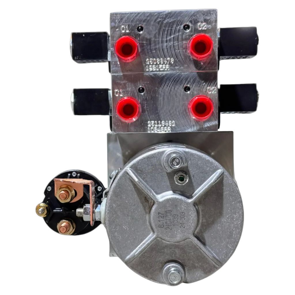 Top view of a Bucher Hydraulics, Inc. Bucher 4 Way Pump hydraulic power unit with metal valves, red ports, electrical components, and an adjustable relief valve for precise pressure control in a dual power circuit system.