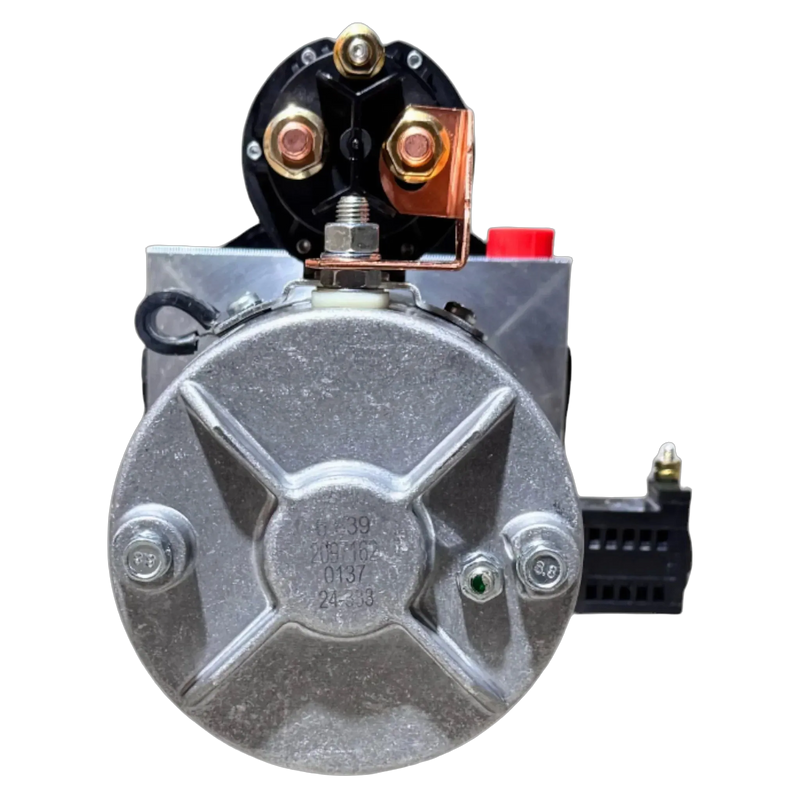 Close-up of a Bucher Dual Action (Power Up / Power Down) Hydraulic Pump by Bucher Hydraulics, Inc., showing terminals and metal casing against a white background—ideal for integration with an agricultural hydraulic power unit.