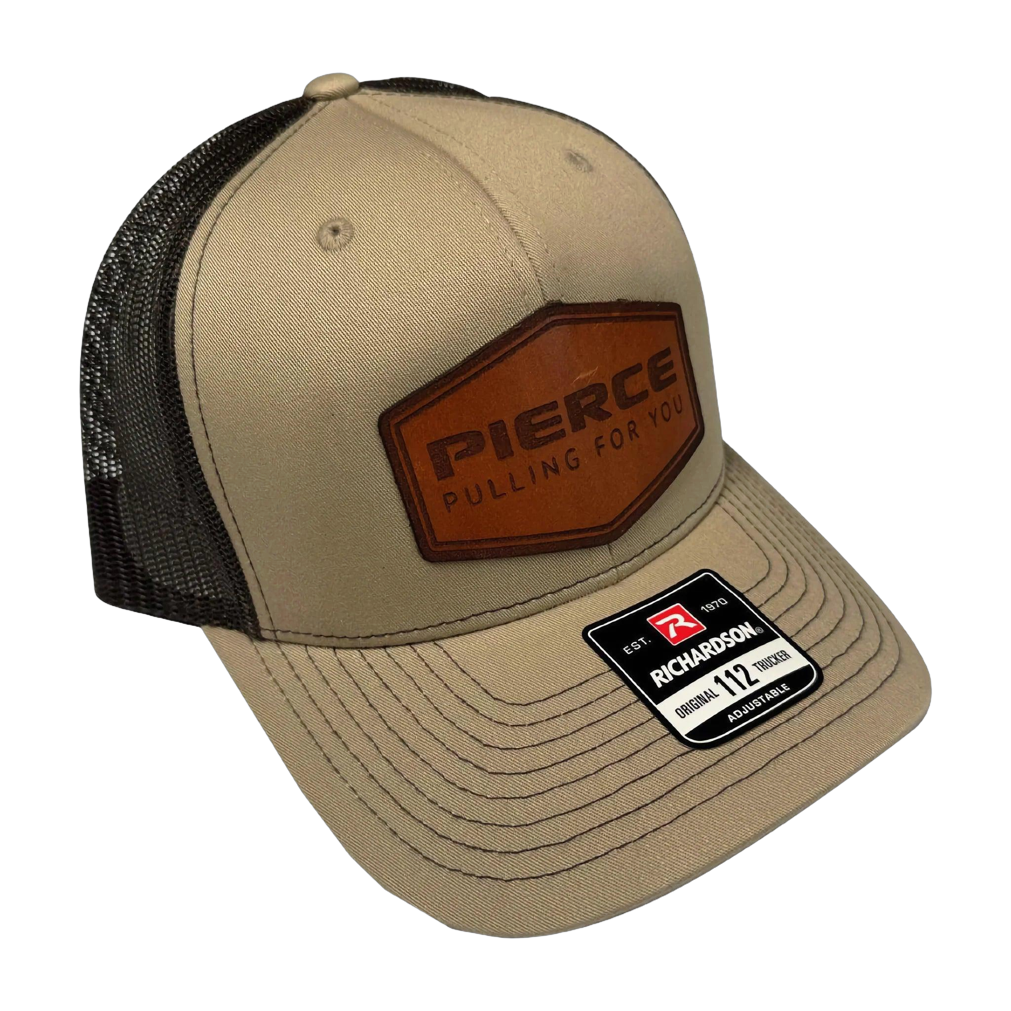 Tan and black mesh adjustable ball cap from PIERCE, featuring a leather patch and a Richardson 112 label on the brim, perfect for enhancing any hat collection.