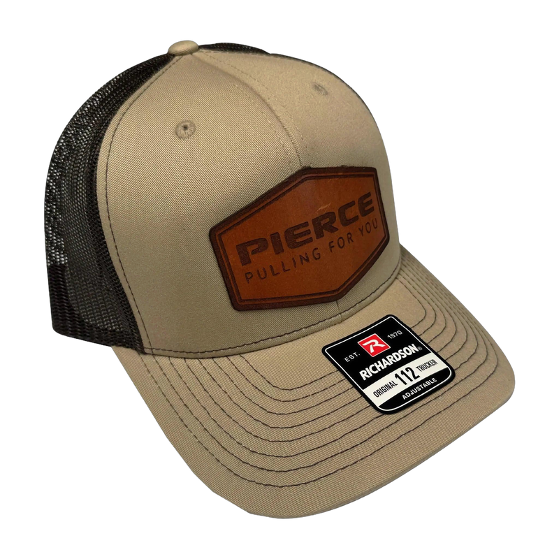 Tan and black mesh adjustable ball cap from PIERCE, featuring a leather patch and a Richardson 112 label on the brim, perfect for enhancing any hat collection.