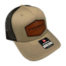 Tan and black mesh adjustable ball cap from PIERCE, featuring a leather patch and a Richardson 112 label on the brim, perfect for enhancing any hat collection.