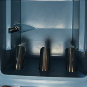 The PIERCE VaxMate Vaccine Cooler features three metal cup dispensers in a blue compartment, perfect for storing vet supplies or as a livestock vaccine cooler.