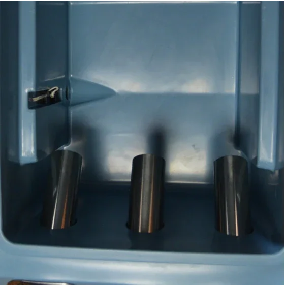 The PIERCE VaxMate Vaccine Cooler features three metal cup dispensers in a blue compartment, perfect for storing vet supplies or as a livestock vaccine cooler.