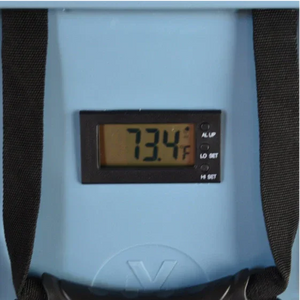A digital display shows a temperature of 73.4°F on the blue PIERCE VaxMate Vaccine Cooler with black straps.