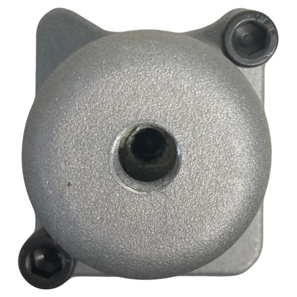 A circular metal object with a central hole, mounted on a square base with three visible screws, resembles the APSCO Bolt-on Actuator for Gresen Spool, similar to components used in Miller Towing Equipment for reliable performance.